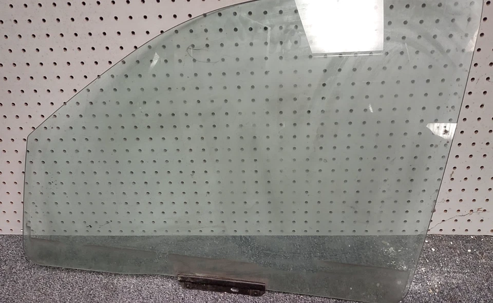 Vidrio de puerta delantera izquierda lado de transmisión Jeep Grand Cherokee 99-04 OEM - tinte de fábrica Foto 2 de 4