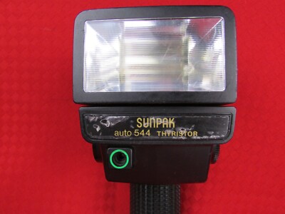 SUNPAK Auto 544 Thyristor Handle Flash w/battery, charger, camera 