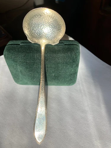 Vintage sterling silver hammered sugar spoon--International Silver or Meriden?