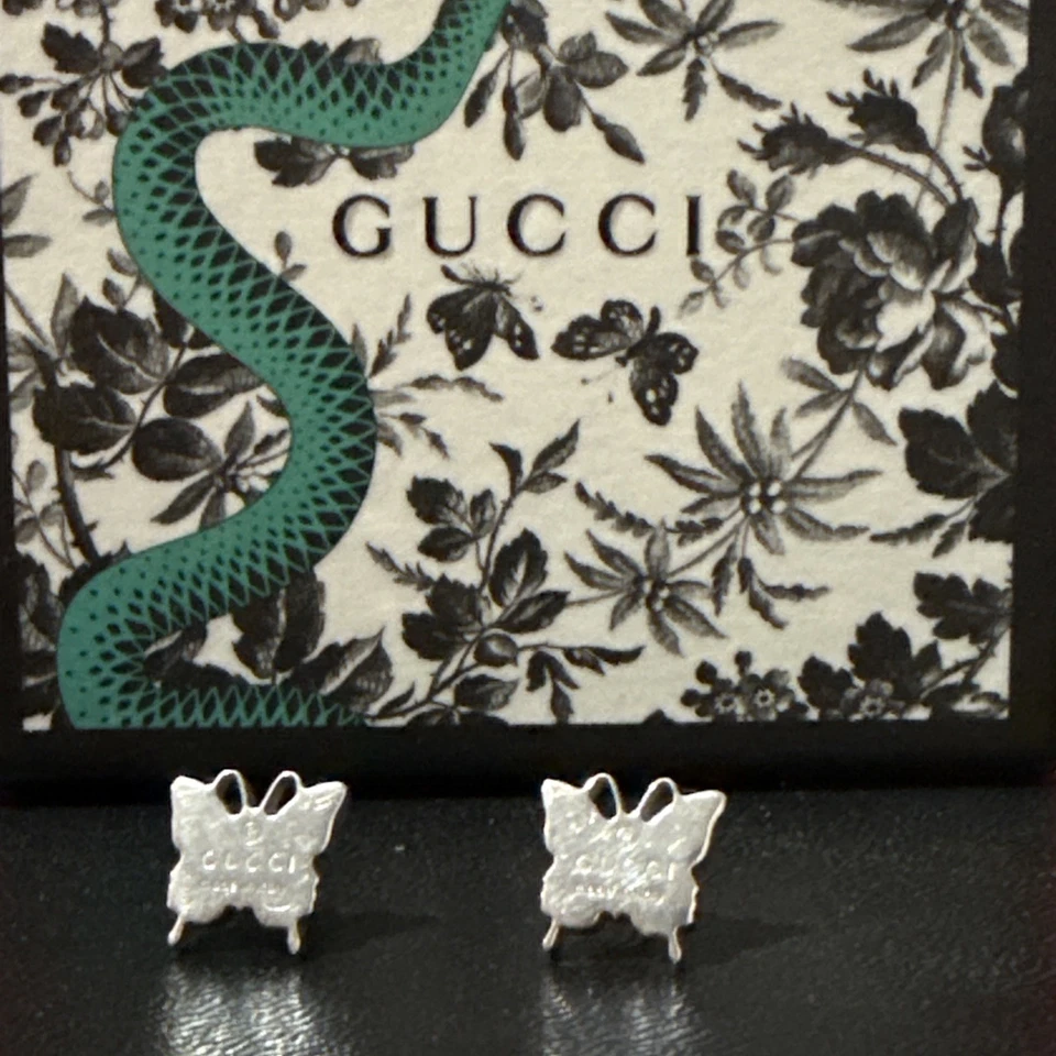 Pendientes mariposa Gucci de plata de ley Foto 3 de 4