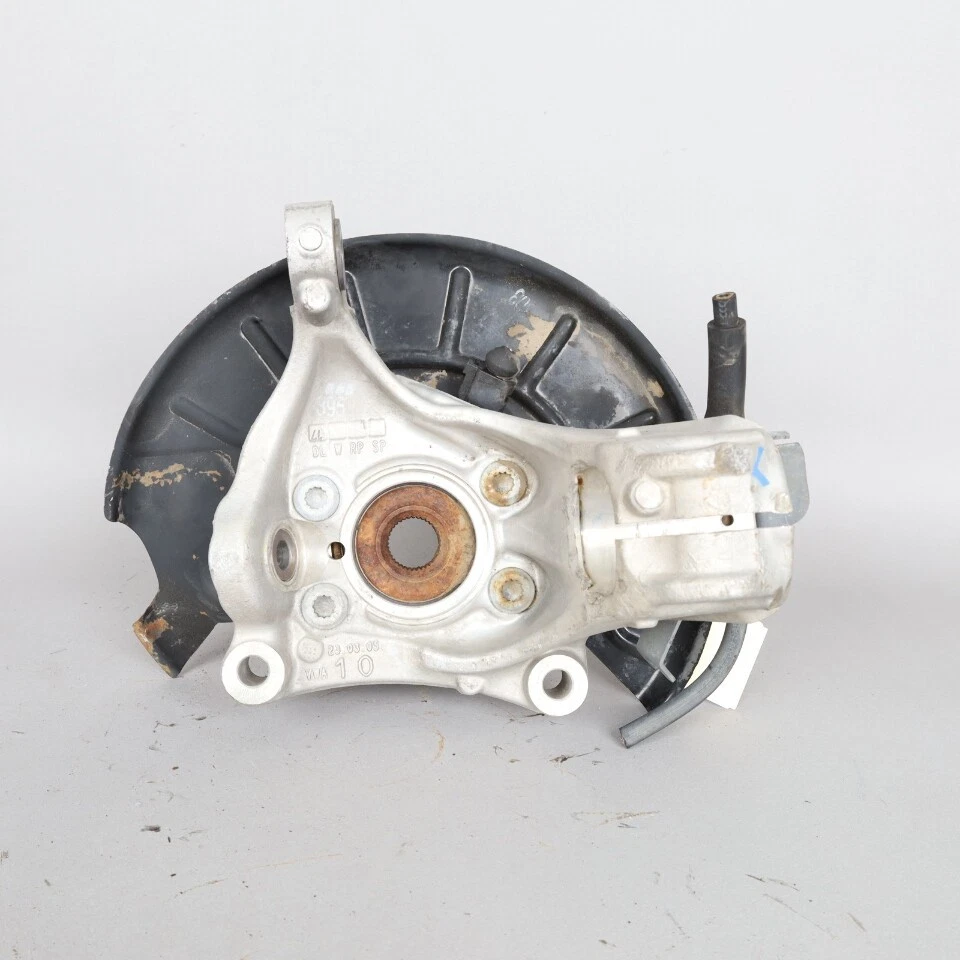 Volkswagen Passat 2006-2010 eje delantero izquierdo buje nudillo 3C0407253F fabricante de equipos originales usado Foto 2 de 4