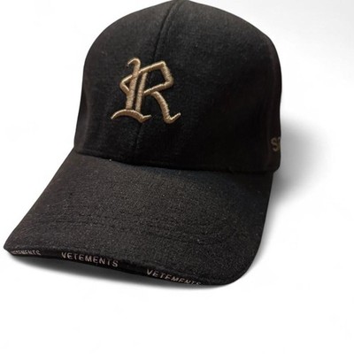 Vetements black cap with gold embroidered logo
