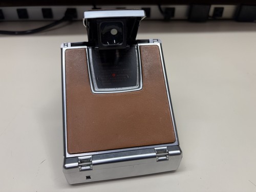FOTOCAMERA TERRESTRE VINTAGE POLAROID SX-70 ALFA 1 PER RIPARAZIONE RICAMBI CREPA NON FUNZIONANTE - Foto 6 di 11