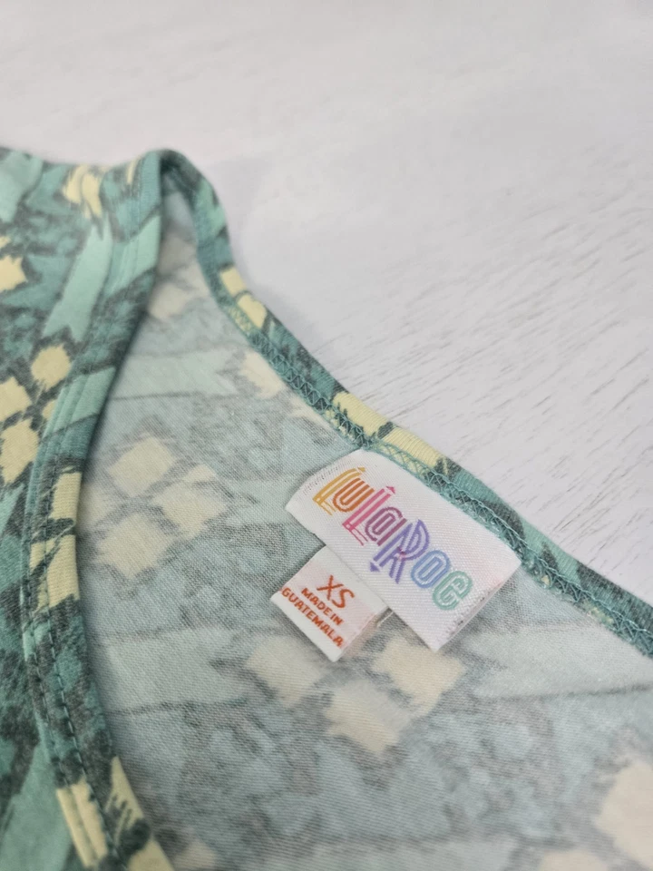 Camisa túnica LuLaRoe Irma azul y amarilla para mujer talla Xs Foto 4 de 4