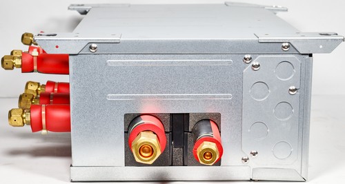 Silver Mitsubishi Electric PAC-LMA30BC branch box with red and black RCA ports and circular cable connectors on the side.