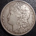 Better Date 1904-P Morgan Silver Dollar - VF Condition - WWII Graffiti