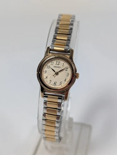 Vtg Womens Seiko 1N01-0GD0 Gold Tone Watch NEW BATTERY Stretch Band