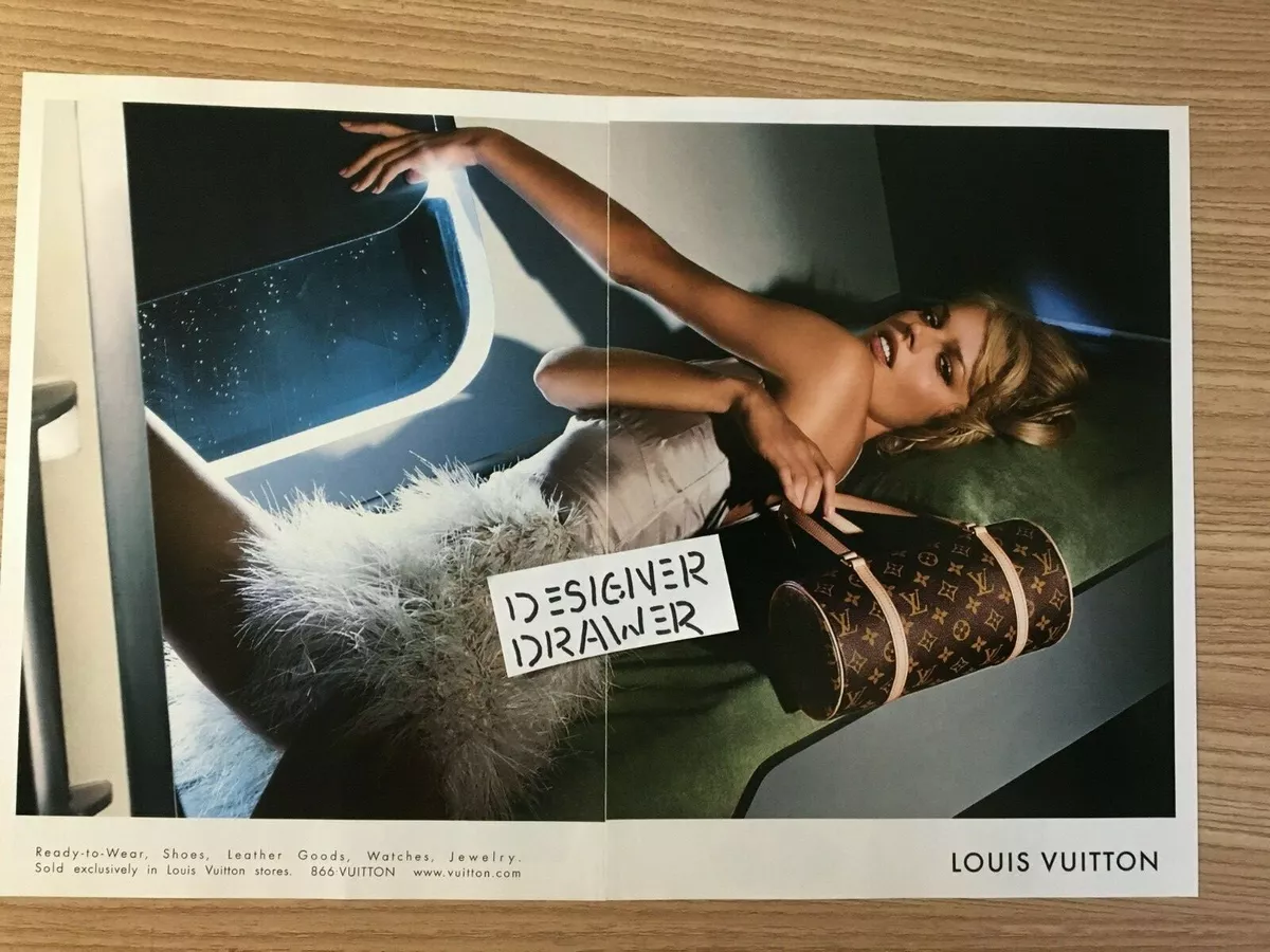 poster advertising Louis Vuitton handbag in paper magazine from