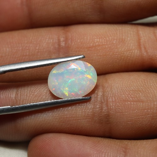 3 Carat Natural Green Red Blue Multi Fire Ethiopian Opal Oval Cut 12.8x9.9 MM - Picture 6 of 7