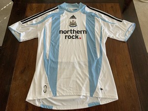 white and baby blue jersey