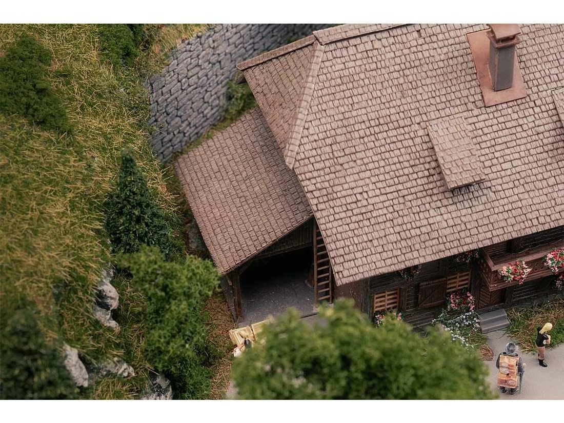 Faller 130012 H0 Jubiläumsmodell Uhrenmacherhaus mit Figur