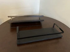 Pair of black wooden shelf’s with towel rack attached 