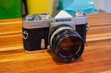 Konica Autoreflex T SLR Camera W/ Hexanon f/1.8 52mm Lens And Leather Case