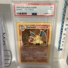 1999 POKEMON BASE SET UNLIMITED #4 CHARIZARD-HOLO PSA 5 Clean…. Regrade?