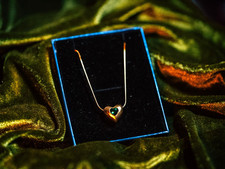 Gold Heart Shaped Necklace with Green Gemstone