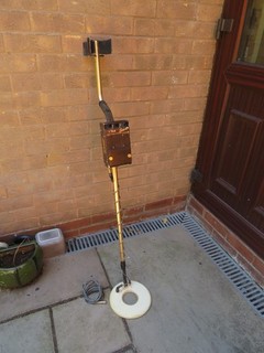 A TESORO GOLDEN SABRE MOTION METAL DETECTOR WITH EXTENSION CABLE FOR RESTORE