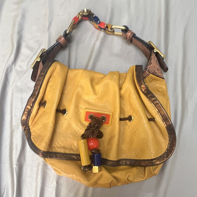 Louis Vuitton Yellow Monogram Embossed Drawstring Shoulder Bag Charm Chain Strap
