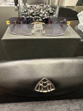 Maybach Glasses Rimless Gold white legs blue lens