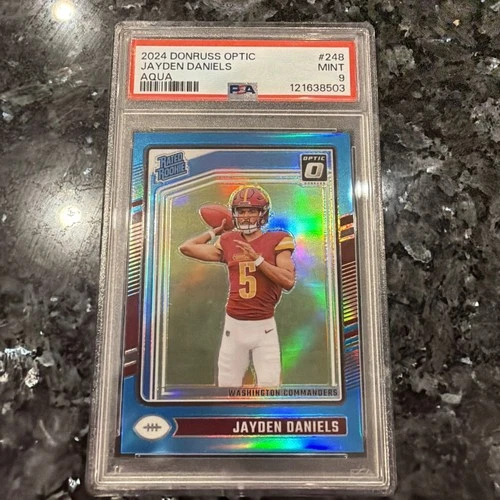 2024 DONRUSS OPTIC ROOKIE  JAYDEN DANIELS AQUA /299 PSA 9 MINT🔥