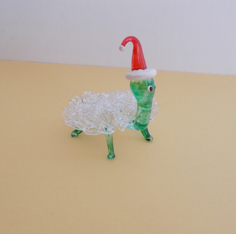 hand blown Christmas glass turtle wearing Santa hat
