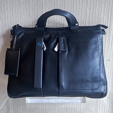 Piquadro Valigetta in pelle nera borsa per laptop 41x33 cm nuova con etichette e dust bag