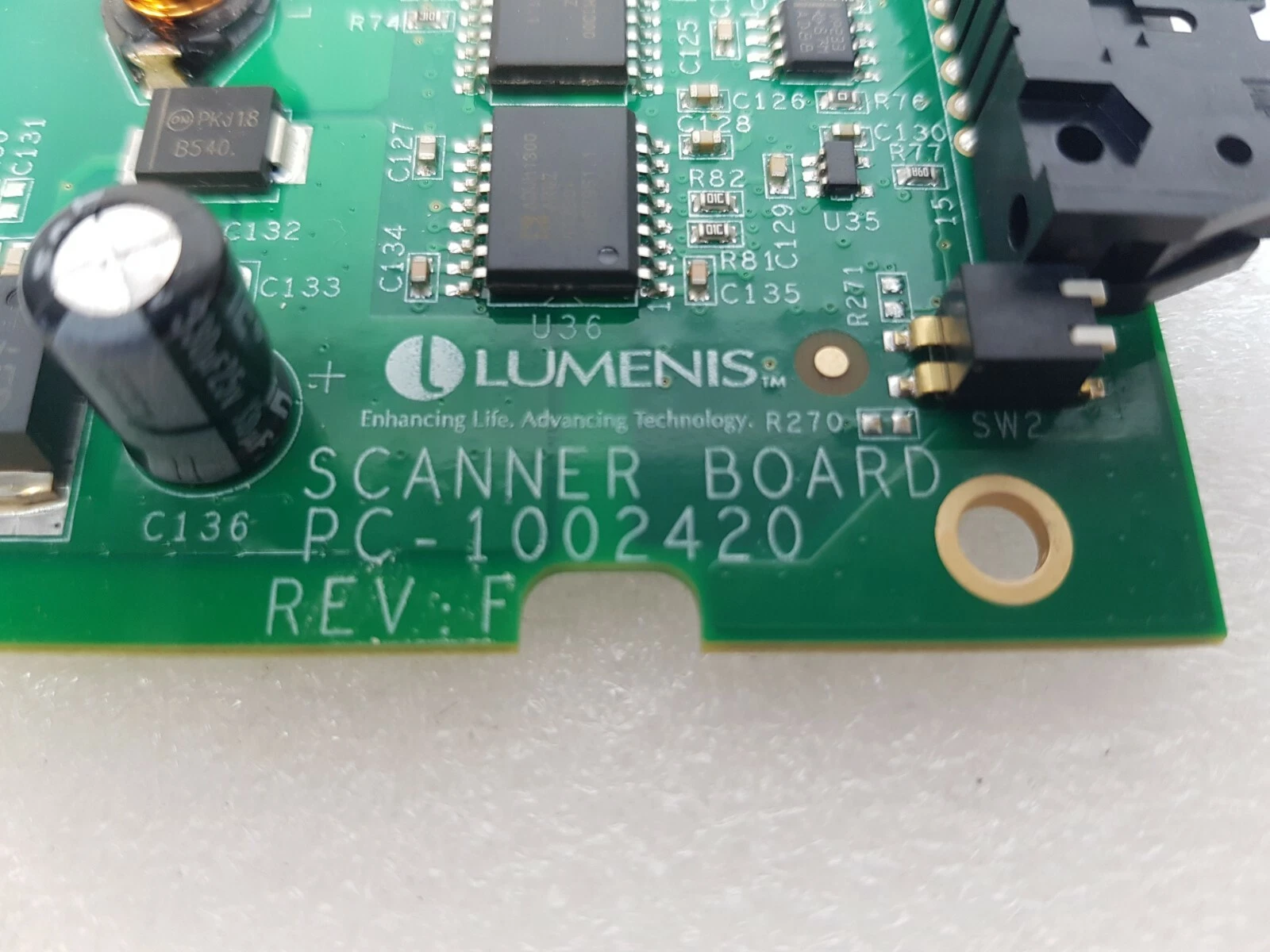Lumenis logo and silkscreen SCANNER BOARD PC-1002420 REV:F next to DIP switch SW2