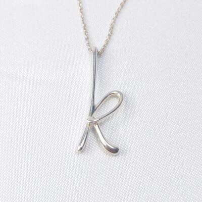 Tiffany & Co. Initial Letter 