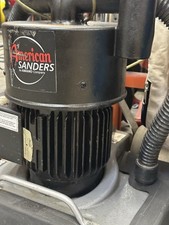 This is an American Sanders OBS-18DC Orbital Square Buff Floor Sander.