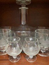 Etched  sailing Ship decanter and 10 glasses. Hardly ever used.