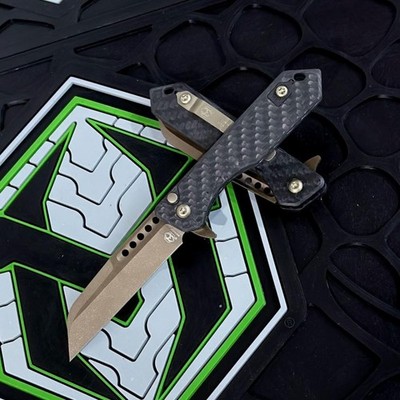 Heretic Knives USA JINN MANUAL FOLDER BRONZE W/CARBON FIBER CHASSIS H213-7A-CF
