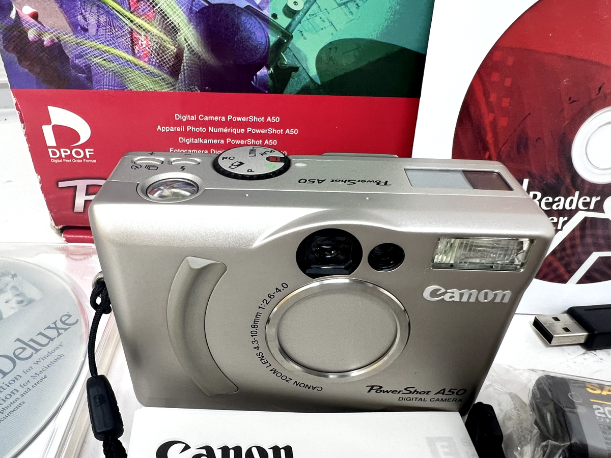 Canon Powershot A50 digital camera W/BOX NEW Batteries! TriPod