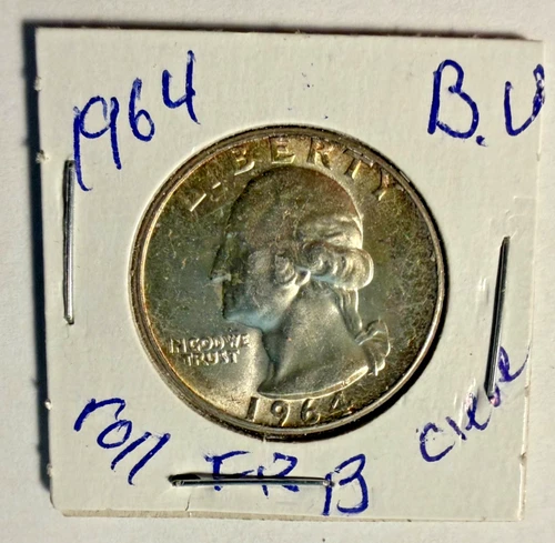 1964 silver quarter BU. FRB Cleveland roll. Edge and overall gold toning