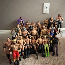 WWE Wrestling Action Figures Mixed Lot of  31 (4 damaged)with Ring & Accessories