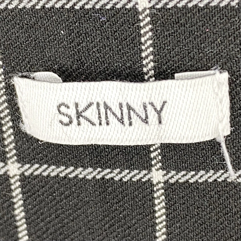 Pantalones ajustados a cuadros negros blancos elásticos talla grande bolsillos de imitación Elle Foto 4 de 4