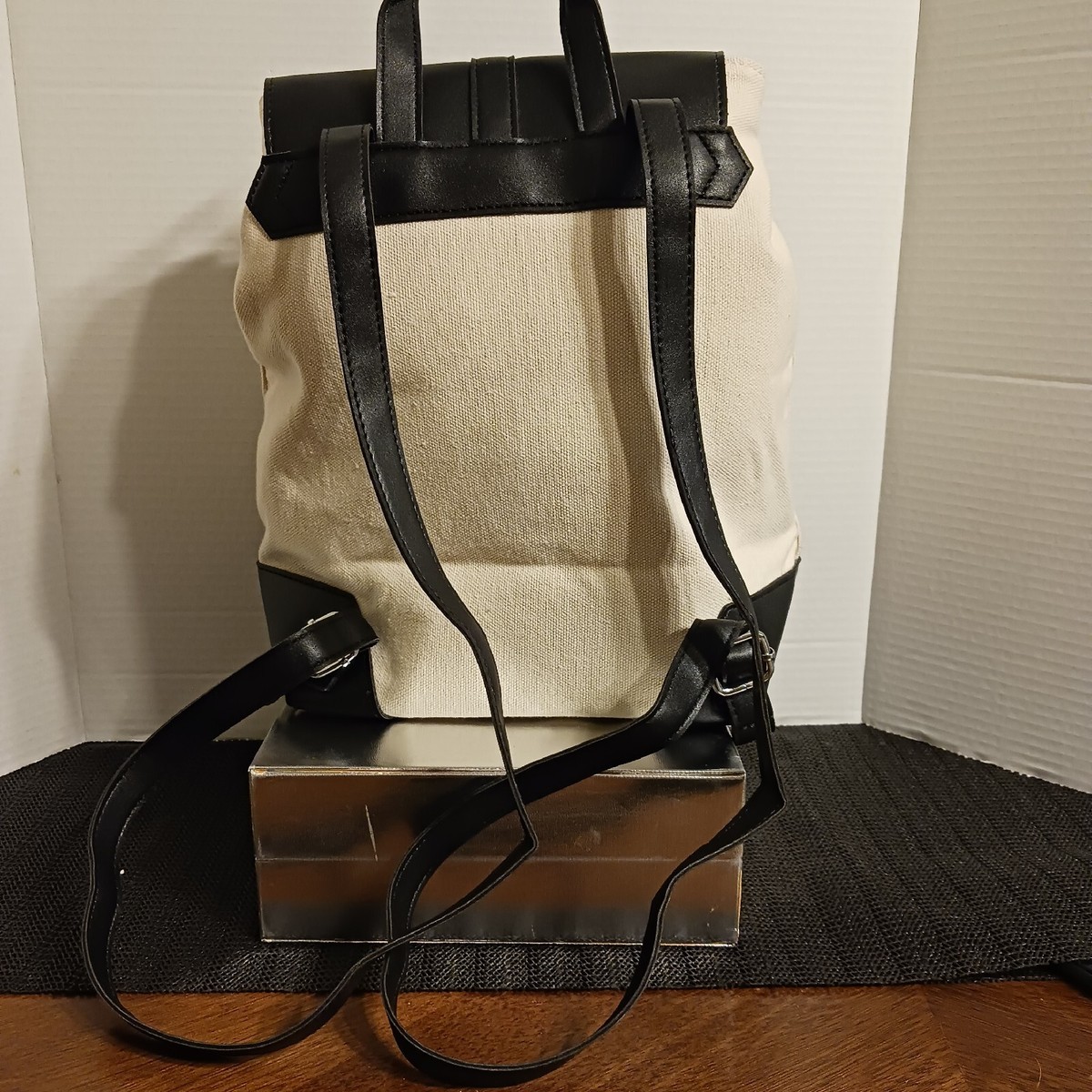 Deux Lux Demi Backpack Ivory Canvas Black Vegan Leather Trim  display picture 1
