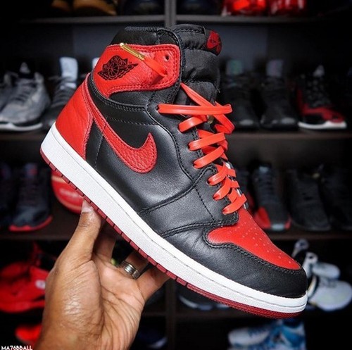 black jordan 1 with red laces