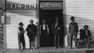 PHOTO PRINT Men Outside Sam King Saloon Dog Sierra Beer Sign Hats Suspenders