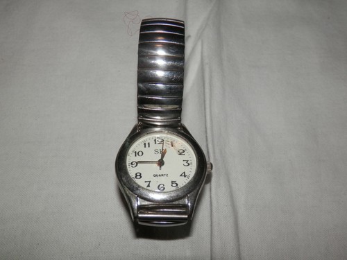 vecchio orologio da polso SK QUARTZ water resistant in acciaio steel back  di da | eBay
