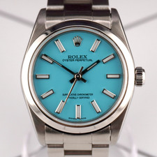 Rolex Oyster Perpetual 31mm Stainless Steel Baby Blue Dial Watch Ref 67480 11