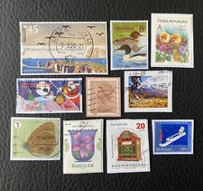 Lot de 10 timbres de Pays divers et années diverses - encore sur frag Stamps L54