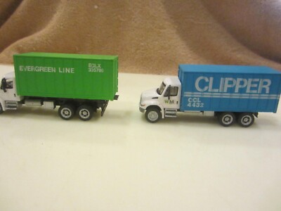 HO SCALE TRUCKS w Container loads unk maker EVERGREEN AND CLIPPER