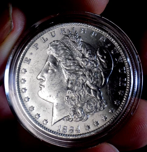 MORGAN SILVER DOLLAR 1884 O GEM BU FROSTY WHITE IN HARD PLASTIC CASE 90% SILVER