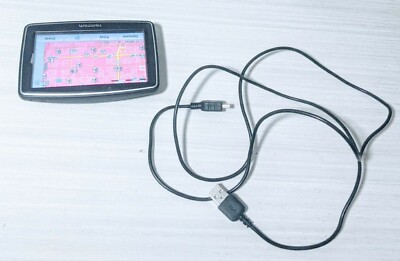 TOM TOM XL GPS N14644 Turns On just fine, sold AS SHOWN w/ usb 310