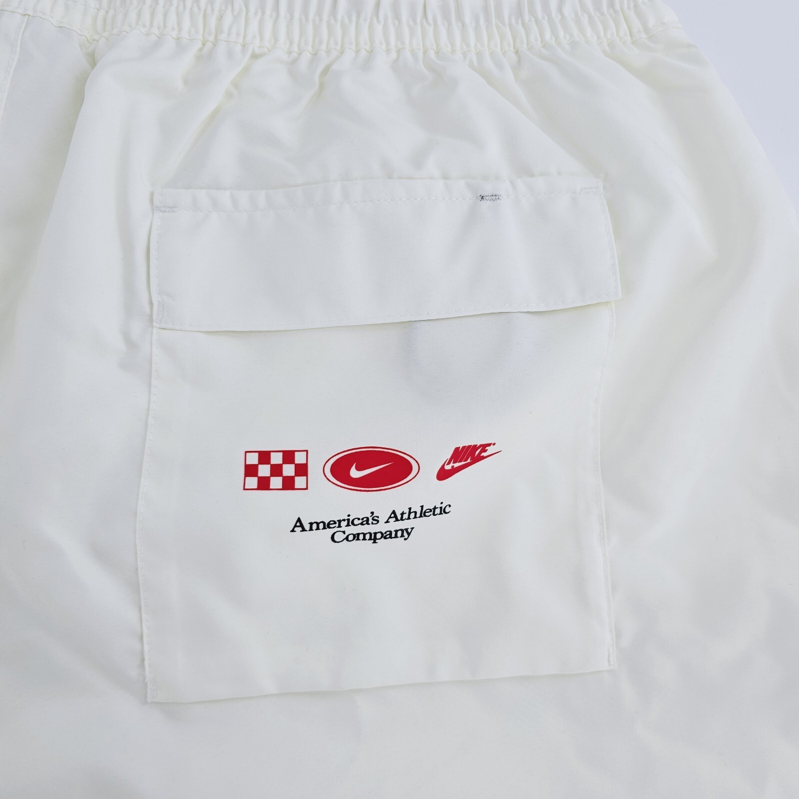 OFF WHITE X NIKE Pantaloncini Nike Sportwear NSW Woven Flow Americana da uomo X LARGE XL bianco avorio NUOVI