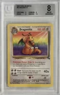1999 Pokemon Fossil Unlimited Dragonite #19 R BECKETT 8 NM-MT