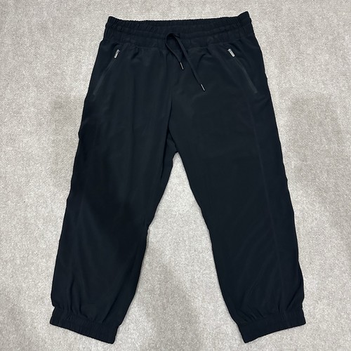 Zella Damen große schwarze Reißverschlusstasche Knöchel Crop Kordelzug leichte Hose