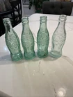 Lot of  4 Vtg Glass Coca-Cola Hobbleskirt Bottles 1915,1923,1923,1929