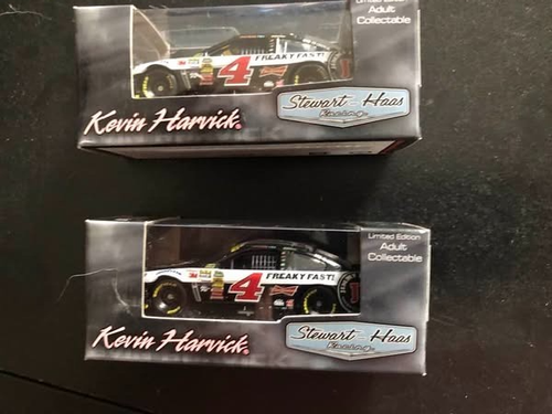 Two 2014 #4 1/64th diecast celebration of Harivick's Jimmy John's championship.