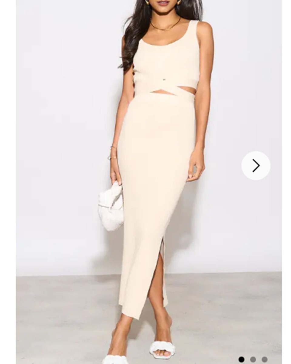 Knitted bodycon style vest top with tie up design and midi pencil skirt  co-ords