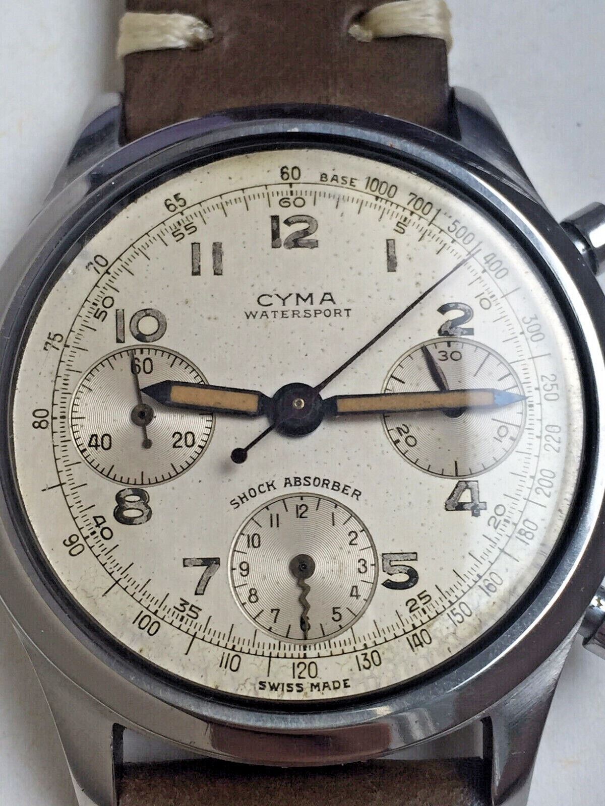 oversized vintage clamshell CYMA Tavannes watersport chronograph Valjoux 71